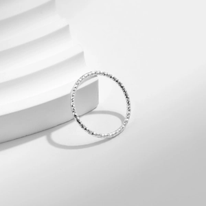 Minimalist S925 sterling silver ring with shimmering textured surface in silver