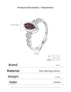 Macro detail of S925 silver ring with 12x7mm marquise red stone and white zircon accents