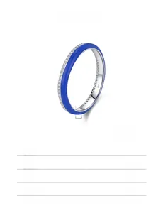 Detail showing S925 silver ring with blue enamel and pavé cubic zirconia accents