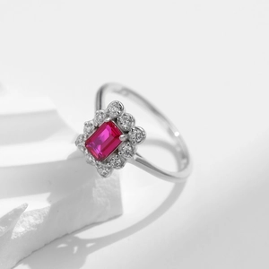 Elegant S925 silver ring featuring a square red ruby and diamond halo on stone base