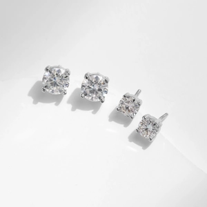 Classic S925 sterling silver four-prong moissanite stud earrings in two different sizes