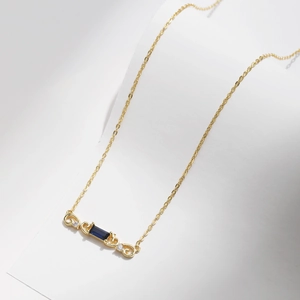 Vintage S925 silver necklace with rectangular blue gemstone and gold vine detailing