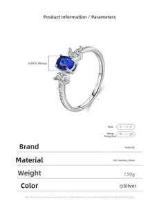 Macro detail of S925 silver ring featuring blue sapphire stone and marquise diamonds