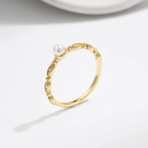 Exquisite S925 silver gold-plated ring with a central pearl and sparkling zircon accents