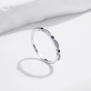 Sparkling S925 sterling silver bow ring with blue gemstones and micro-pave white zircon