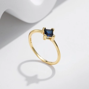Elegant S925 sterling silver ring with square blue gemstone in a classic four-prong setting