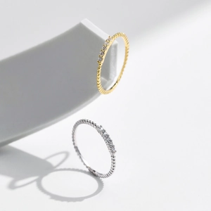 Minimalist S925 silver stackable rings with sparkling stones and textured band detail