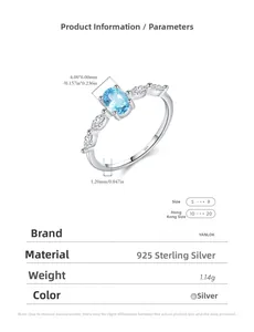 Detail of S925 silver ring featuring 4x6mm oval blue crystal and side diamonds