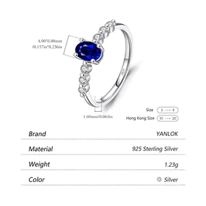 Elegant s925 sterling silver ring with blue gemstone and white zircon accents