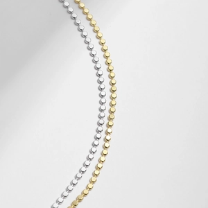 Minimalist s925 silver and gold bean choker necklaces displayed on a white background