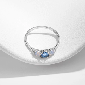 S925 silver geometric ring featuring a blue center crystal and side accent diamonds