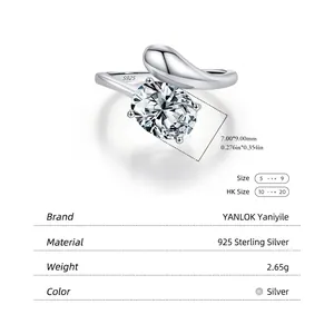 S925 sterling silver snake-like ring with 7x9mm oval gemstone on grey background