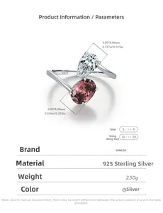 Macro shot of S925 sterling silver ring with pear and oval-cut intertwined crystals