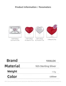 Detailed view of 925 silver heart and envelope charms set with cubic zirconia