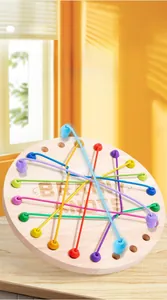 Macro view of wood logic game board with colorful elastic cords for brainy knot puzzles