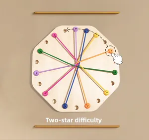 Detail of wooden threading puzzle board with colorful strings showing two-star difficulty