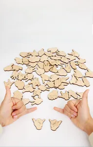 Detailed view of wooden hand gesture puzzle pieces for fine motor skill training