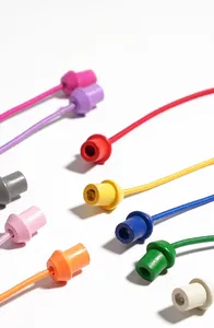 Detailed view of colorful elastic cords with wooden cylindrical tips for kids logic games