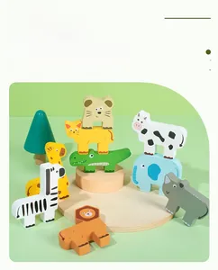 Close-up of wooden animal balancing blocks featuring lions and zebras in soft pastel colors