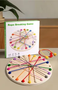 Detail of wooden game board and colorful elastic ropes for cognitive logic training