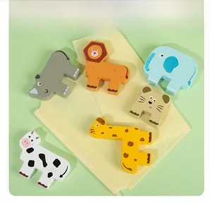 Detailed view of colorful wooden animal balancing blocks with a yellow drawstring storage bag