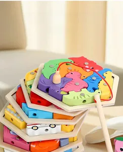 Close-up of hexagonal magnetic fishing puzzle with colorful wooden vehicle and animal pieces