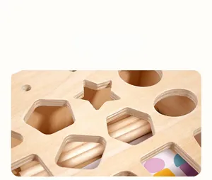 Detailed view of precision cut geometric shapes on a natural wooden educational toy