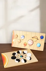Macro detail of wooden solar system puzzle and moon phases educational board for kids