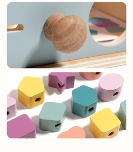 Macro detail of macaron-colored wooden geometric blocks with threading holes for early learning