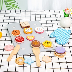 Wooden toy biscuit set with colorful pretend cookies, baking tray, and blue oven mitt