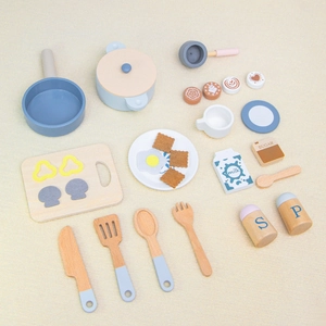 Kids wooden kitchen playset with pastel blue cookware, utensils, and pretend food accessories