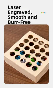 Close-up of laser-engraved smooth edges and colored beads on the wooden puzzle