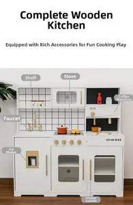 Detailed close-up of white wooden toy kitchen with golden faucet and clicking knobs