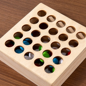 Wooden ball game for children's logic training with colorful beads on 5x5 grid