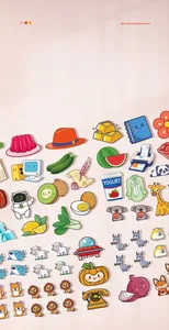 Close-up of colorful cartoon static stickers with animals and food for toddlers