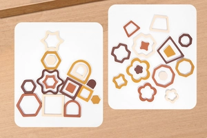Detailed view of nesting silicone geometric blocks in earthy tones for early learning