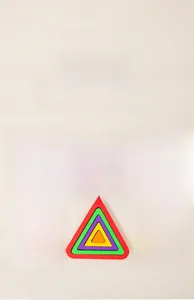 Detail of 3D geometric nesting puzzles with rainbow colors for toddler cognitive training