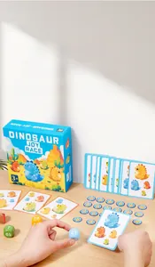 Close-up of children's dinosaur joy race board game with colorful cards and dice