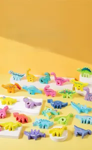 Close-up of 26-piece wooden dinosaur puzzle blocks with colorful A-Z alphabet letters