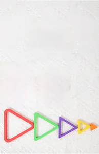 Macro view of rainbow 3d puzzles with colorful wooden stars, circles and triangles
