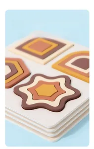 Detailed view of layered wooden geometric puzzles with rounded edges and thick base