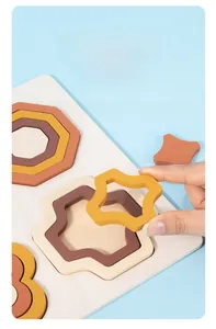 Detail of colorful wooden geometric puzzle shapes with groove design for toddler learning
