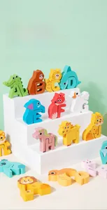 Detail of wooden animal alphabet blocks featuring pastel colors and rounded edges for kids