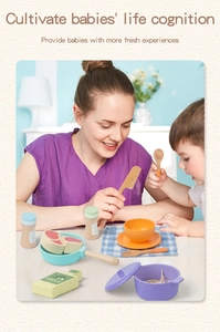 Close-up of wooden toy kitchen set with pastel pans, utensils and olive oil bottle