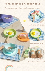 Detail of wooden play kitchen accessories with magnetic meat toy and macaron utensils