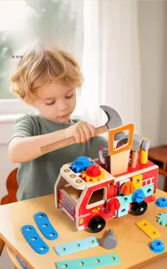 Close-up of a child assembling a red wooden fire truck toy with colorful nuts and tools
