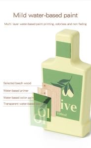 Detailed layered view of wooden olive oil bottle toy with water-based paint coating
