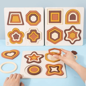 Educational wooden geometric shape puzzle boards with vintage colored nesting blocks