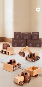 Detailed view of high-quality wooden construction toy vehicles in premium gift packaging