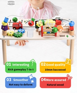 Detail of 7-in-1 wooden busy table with bead maze, gears and car tracks for toddlers